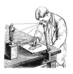 Camera Lucida in use drawing small figurine.jpg